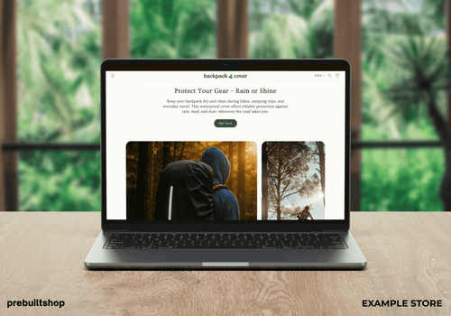 Laptop displaying a website with outdoor gear protection on a wooden table.
